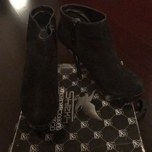 Black booties.